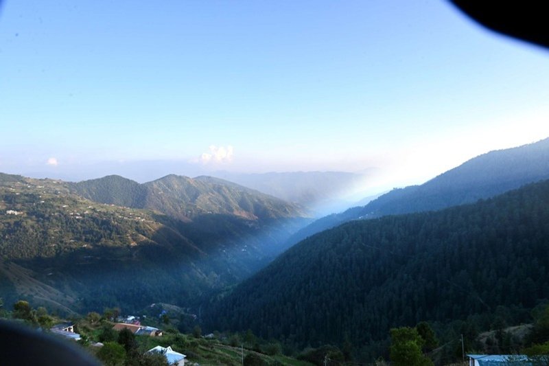 Sweeping Himalayan valley view from Hardys Retreat Chail at dawn