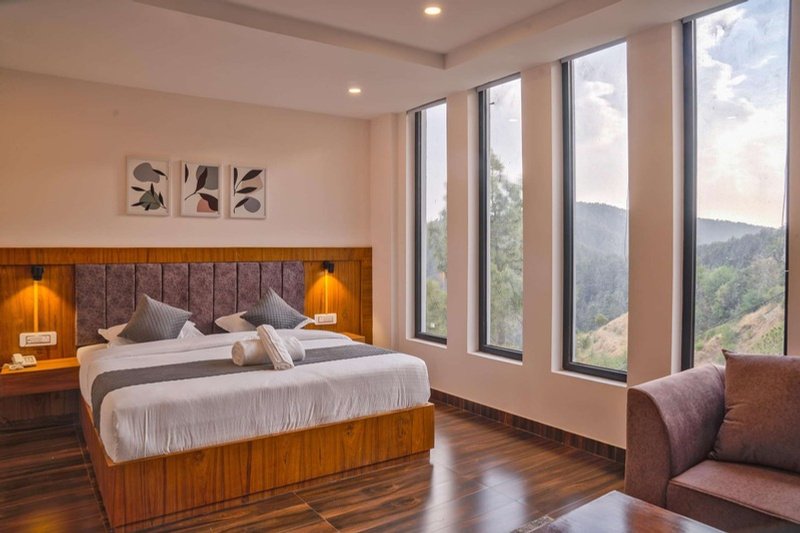Deluxe Double Room at Hardys Retreat — luxury Chail hotel booking with valley windows