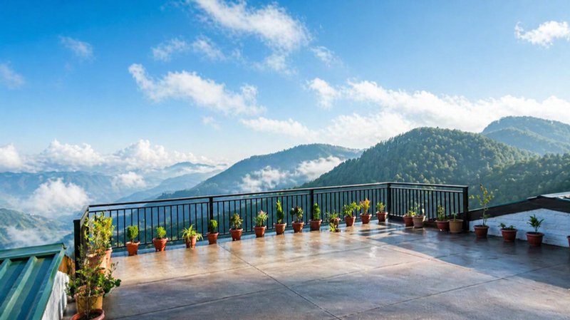 Rooftop terrace at Hardys Retreat Chail with panoramic mountain views
