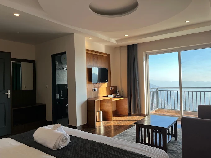 Premium suite with balcony opening to the Chail valley at Hardys Retreat